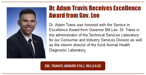Dr. Adam Travis Receives Excellence Award