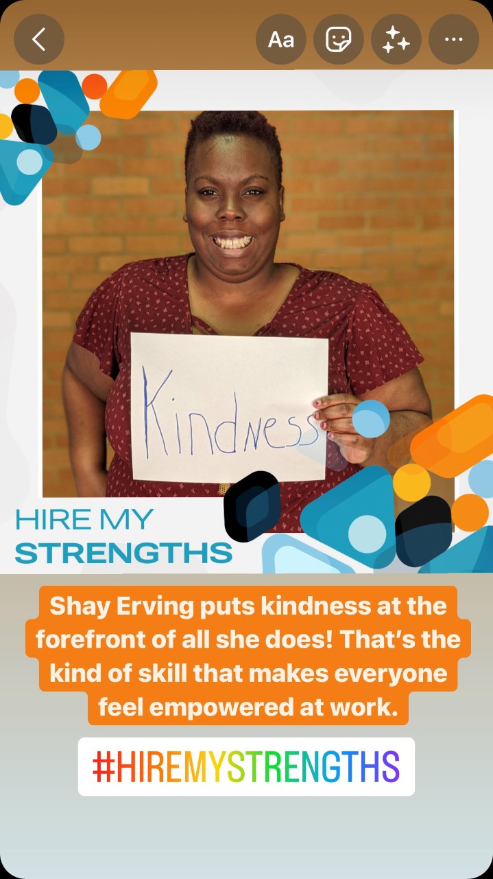 woman holding a sign that says Kindness. Text: "Hire My Strengths. Shay Erving puts kindness at the forefront of all she does!"