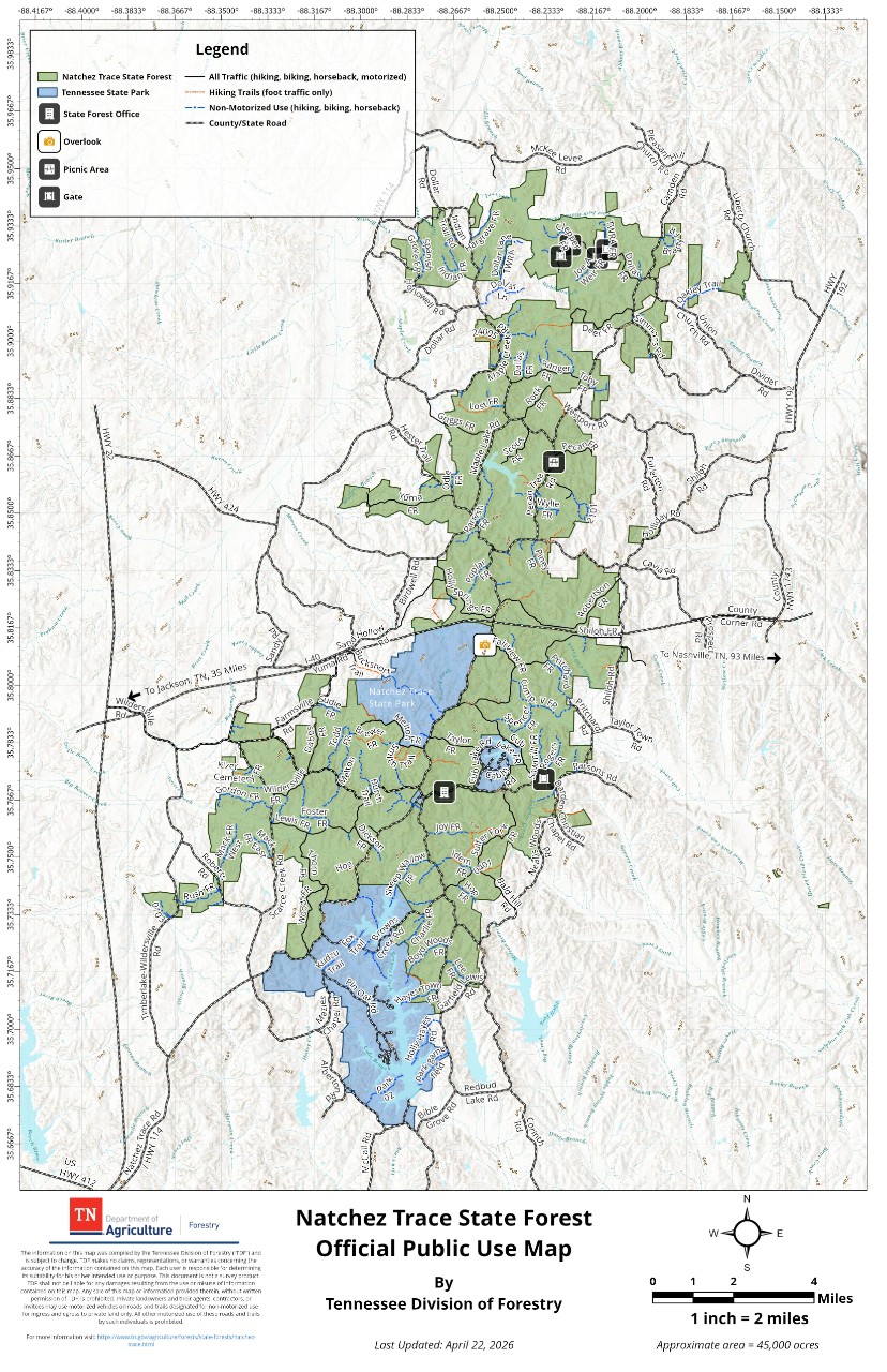 Natchez Trace Full_Public Map_20260422 Official Public Use Map of Natchez Trace State Forest, about 45,000 acres, published by the Tennessee Division of Forestry. The full-extent map shows the forest boundary, road and trail system, road designations, State Forest Offices, picnic areas, an overlook and gate locations, with Natchez Trace State Park located within the forest.