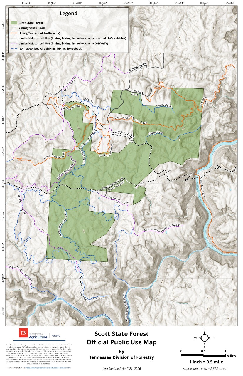 Scott_Public Map_20260421 Official Public Use Map of Scott State Forest, about 2,823 acres, published by the Tennessee Division of Forestry. The map shows the forest boundary, trail system and road designations, with the Big South Fork Cumberland River and John Muir Trail along the eastern edge.