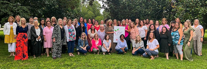 Project_BASIC_Group_web group photo of several dozen Child Development Specialists who are part of Project BASIC