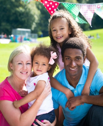 Family_of_four_at_outdoor_festival_no_crop