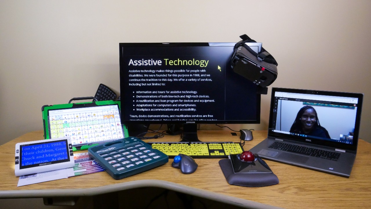 Assistive technology the STAR Center uses to help clients Photo with the article shows an array of various technology devices on a desk in an office that can be used to support people with disabilities.