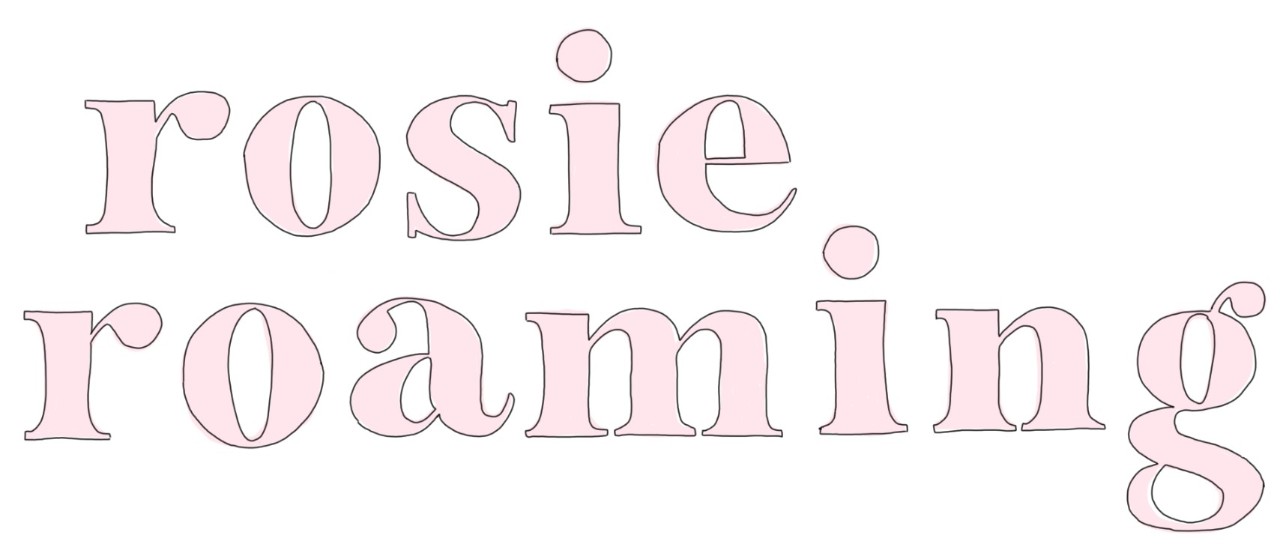 Rosie Roaming logo logo in pink letters "rosie roaming"