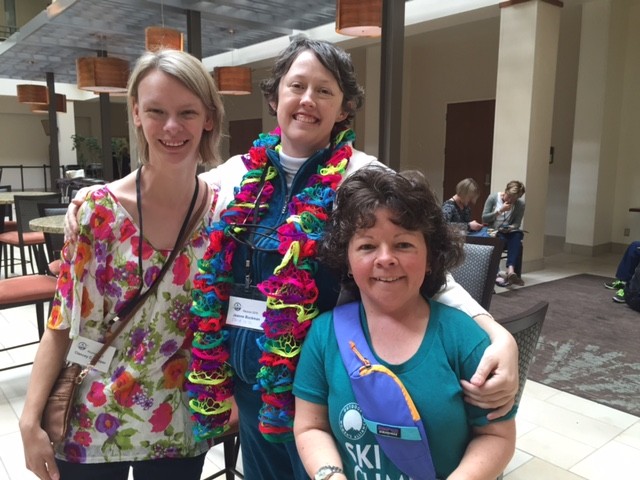 2016 Partners Reunion - Clancey Hopper, Jeanne Buckman, and Sharon Stolberg Three young, white women pose in a hotel lobby with their arms around each other, smiling broadly