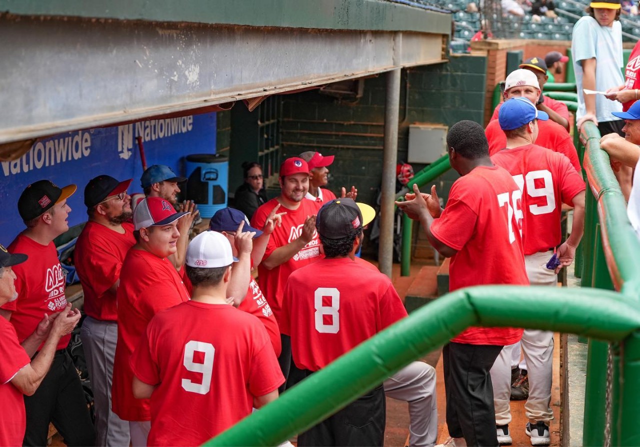 315001193_5728022260588762_4502241034161073065_n the team in red jerseys in their dugout