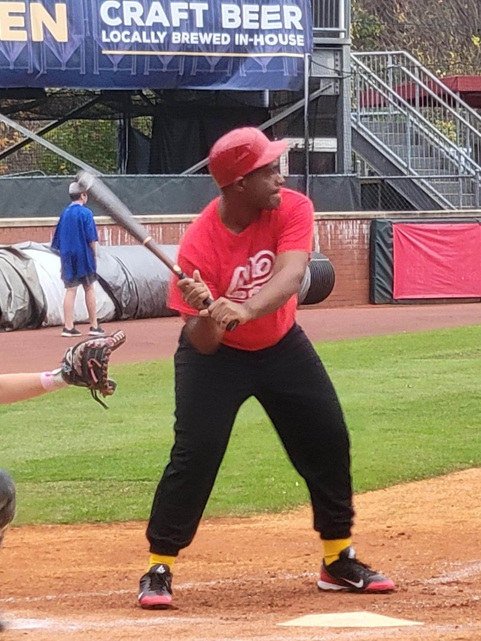 315908336_1618854111892301_8016480507016676720_n baseball player swinging a bat at home plate