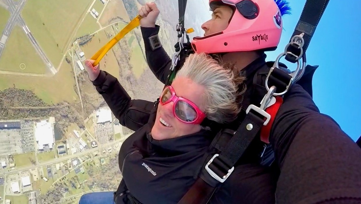 Sarah's skydiving adventure photo 4 Sarah and instructor smile broadly for the camera mid-fall
