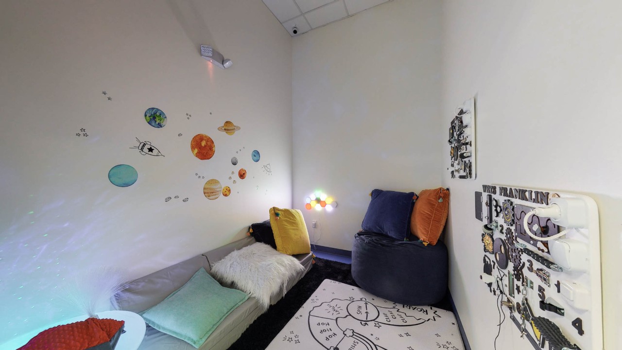 sensory room a dimly lit sensory room filled with pillow and fun but calm furnishings
