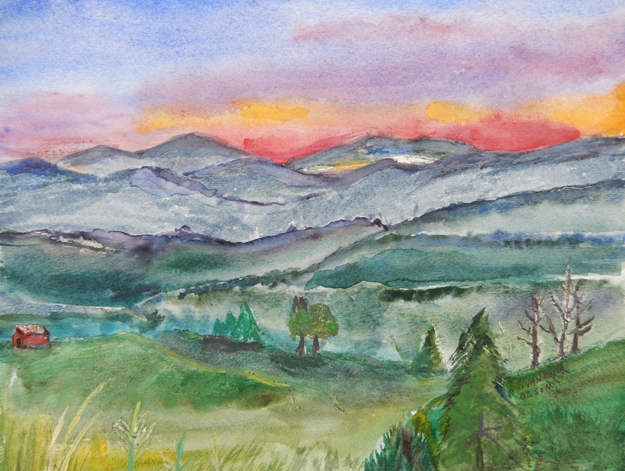 a gorgeous scene of green grass and trees, a small red barn, a blue-ish mountain range, and a red, yellow, purple and blue sky.