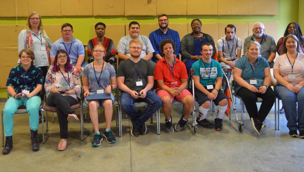 large group photo of Empower TN, Council and STEP staff and about a dozen young adults with disabilities