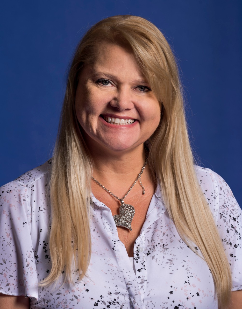 head shot of gina summer, council member