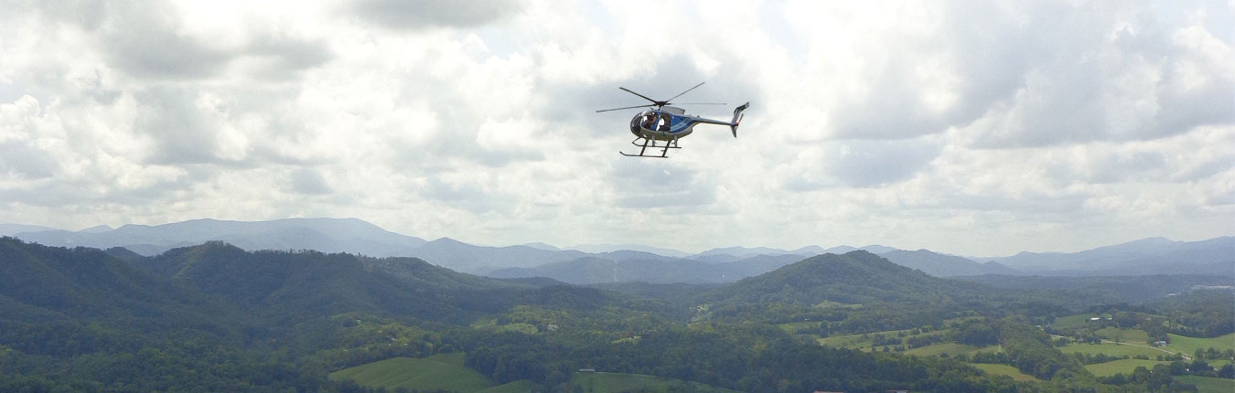helicopter flying over land