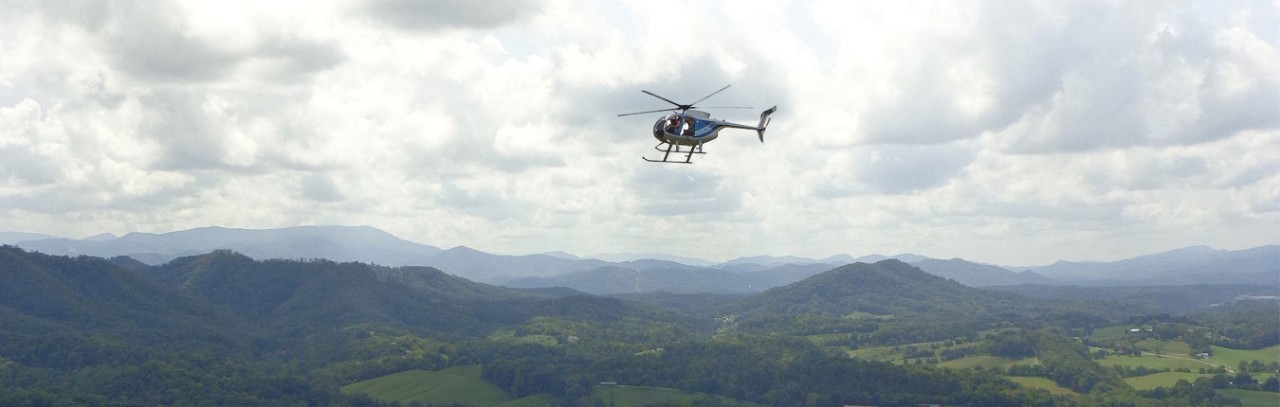 helicopter flying over land