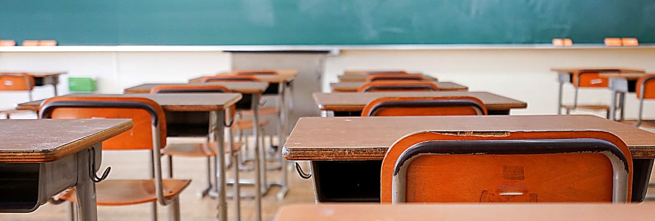 Image of a classroom with desks