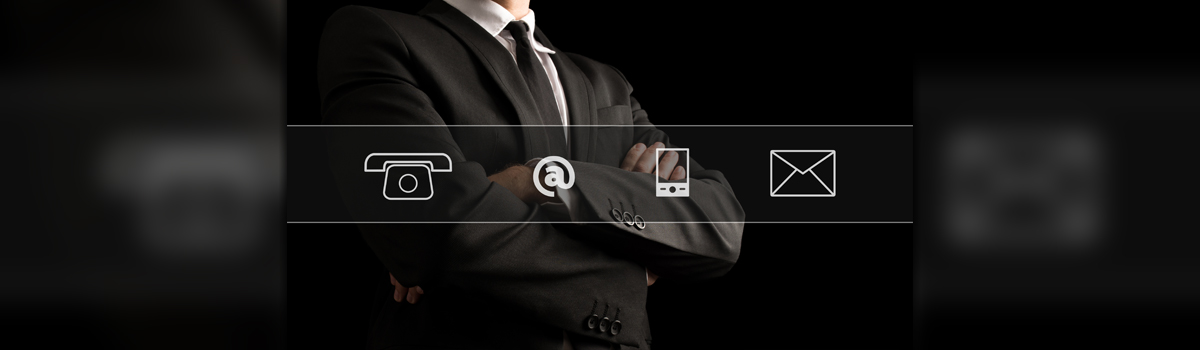 Man in suit and tie with images of a telephone, smartphone and envelope
