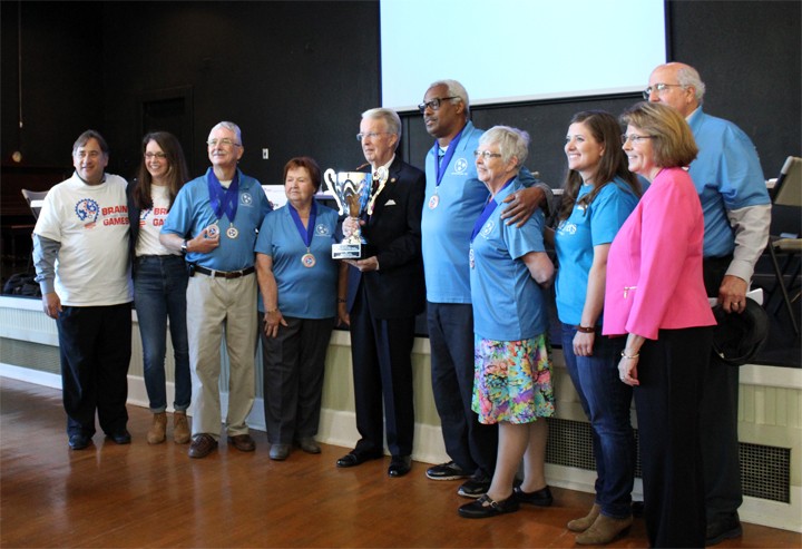 The Jonesborough Olde Towners, newly declared 2017 Tennessee Senior Brain Games statewide champions, stand with TCAD Commission Chair Bill Gentner, Jonesborough Senior Center Director Mary Sanger, and various TCAD and AAAD staff following their win. 