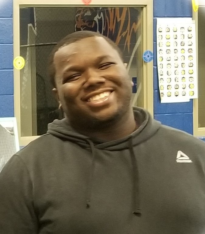 Otis, a young Black man who is a University of Memphis TigerLIFE grad; he is shown smiling and wearing a hoodie.