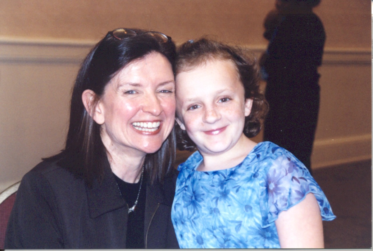 an older photo of Wanda and the daughter of the introduction’s author Lynette Porter. Wanda is shown hugging Hailey, who is a young child with osteogenesis imperfecta. Hailey is now in her mid-20s.