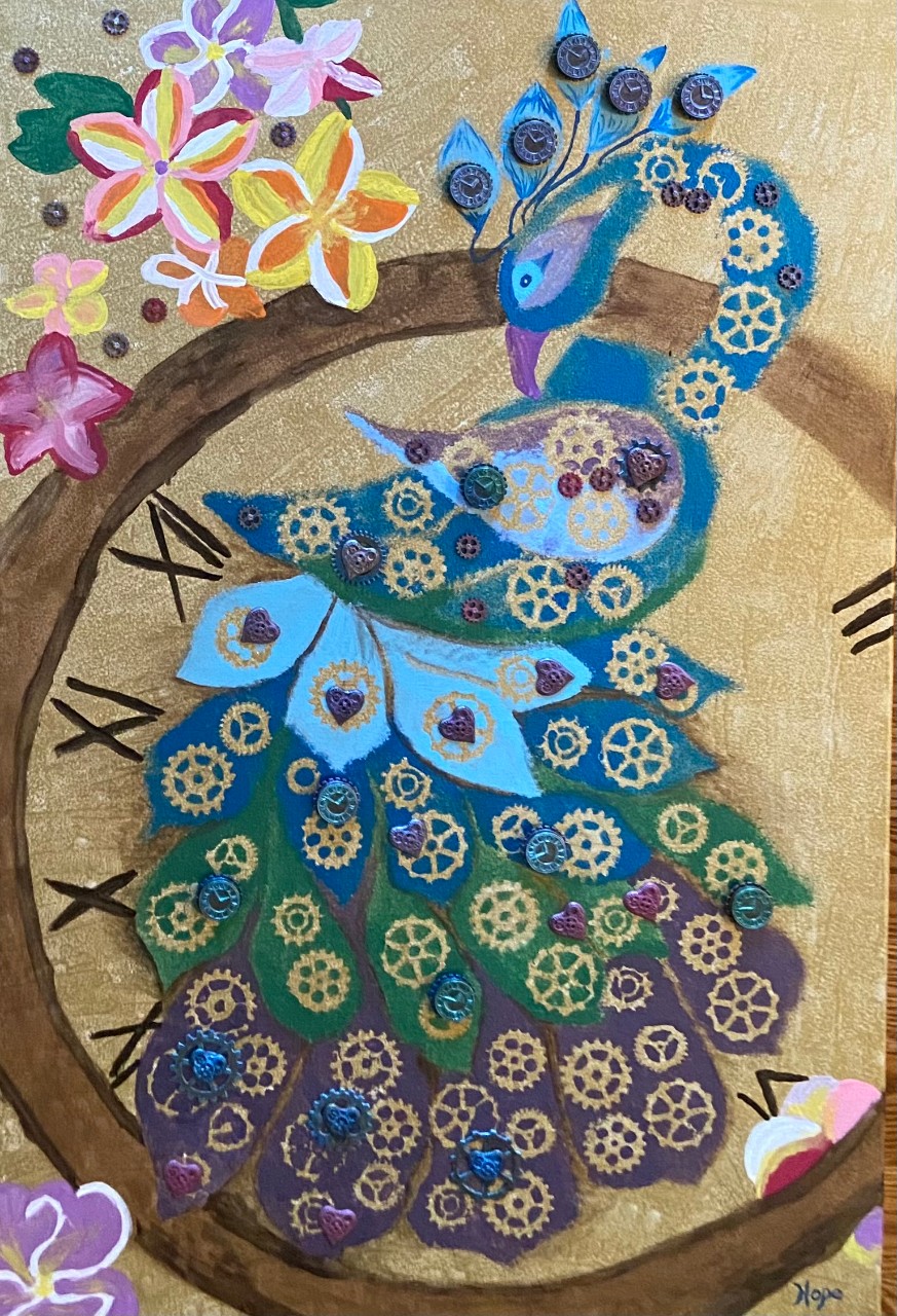 mixed media piece showing a colorful peacock with purple, green and blue feathers made from fabric, decorated with little golden gears, cogs and buttons. The bird is on a painted clock with Roman numerals. The clock is surrounded by flowers. 