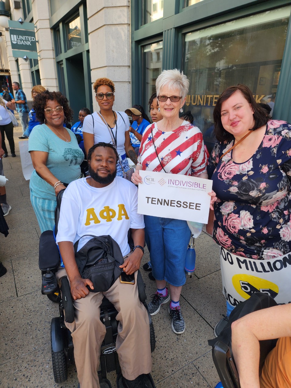 A photo of Tennessee's racially diverse CIL directors posing on a D.C. sidewalk together during this year's conference