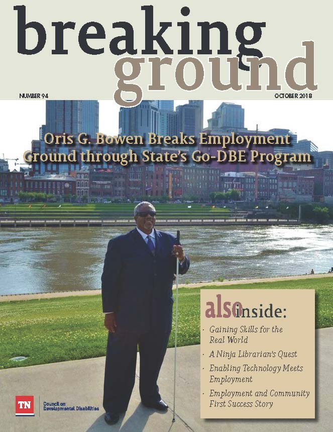 cover of magazine showing a blind african american man wearing sunglasses and holding a white cane in front of the nashville skyline and cumberland river downtown, standing in the sunlight; he's wearing a nice black suit; the text says "breaking ground: october 2018 - oris G. Bowen breaks employment ground through state's Go DBE program"; also lists other articles in the magazine