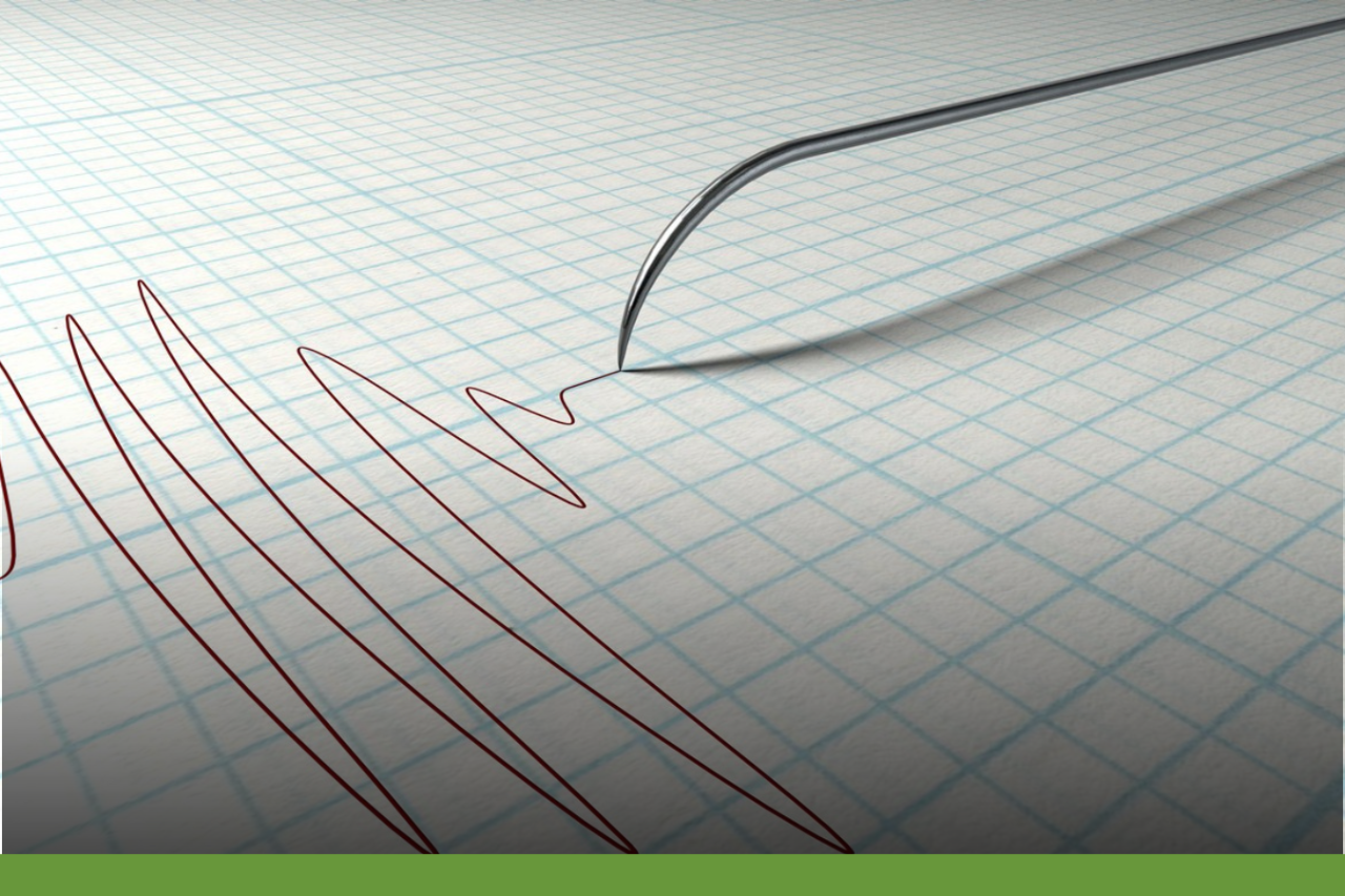 Polygraph needle making wavy lines on graph paper