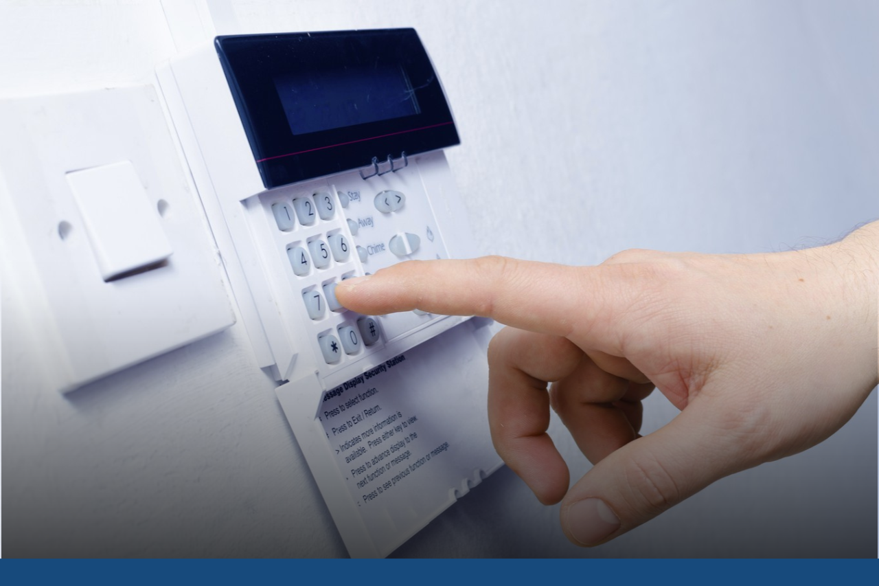 Hand pressing code on alarm control