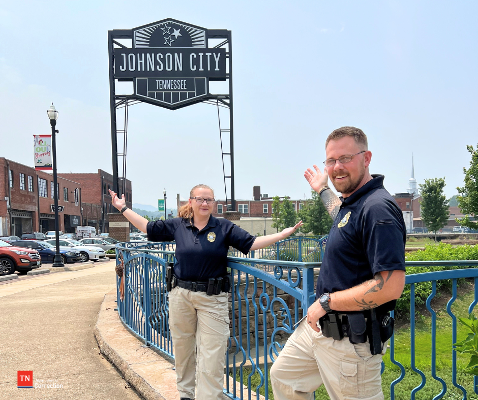Photo of probation parole officer with Johnson City sign