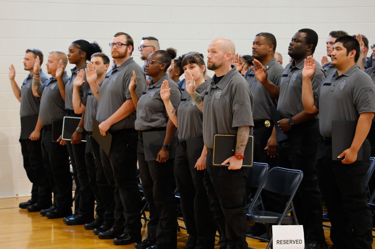 Photo of Large Group of New Correctional Officers Being Sworn In