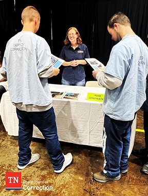 Photo of vendor and offenders at reentry fair
