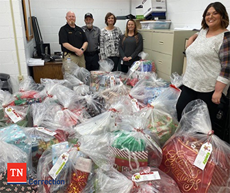Photo of Staff with Donations