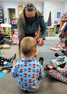 MCCX Staff Donating Angel Tree Gift To Child