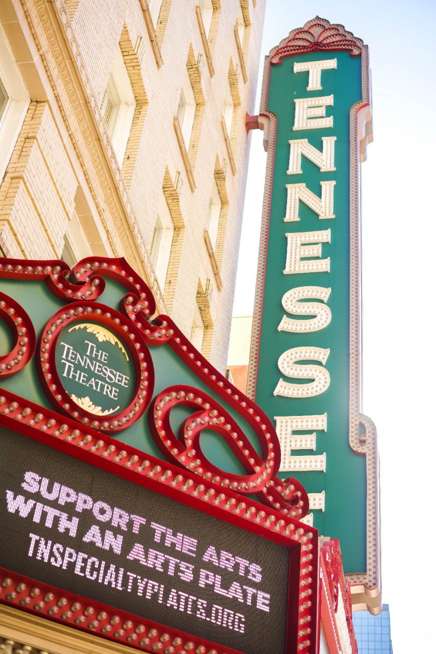 Lit up sign with show descriptions outside of the Tennessee Theatre Lit up sign with show descriptions outside of the Tennessee Theatre