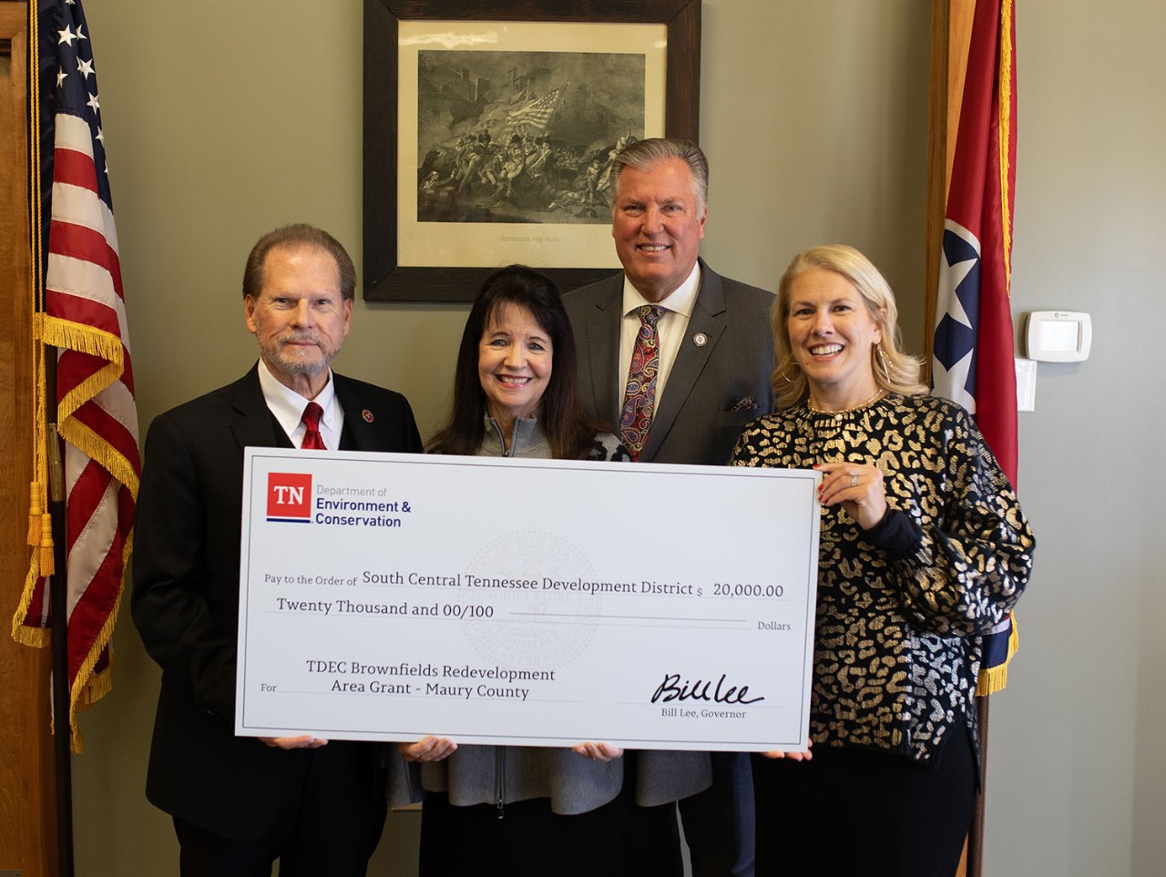 The Tennessee Department of Environment and Conservation presented a check Dec. 6 for $20,000 to Maury County for brownfield redevelopment. From left are Sen. Joey Hensley, R-Hohenwald; Maury County Mayor Sheila Butt; Rep. Scott Cepicky, R-Culleoka, and Lisa Cross, director of Rural Planning Organization/Infrastructure for the South Central Tennessee Development District.
