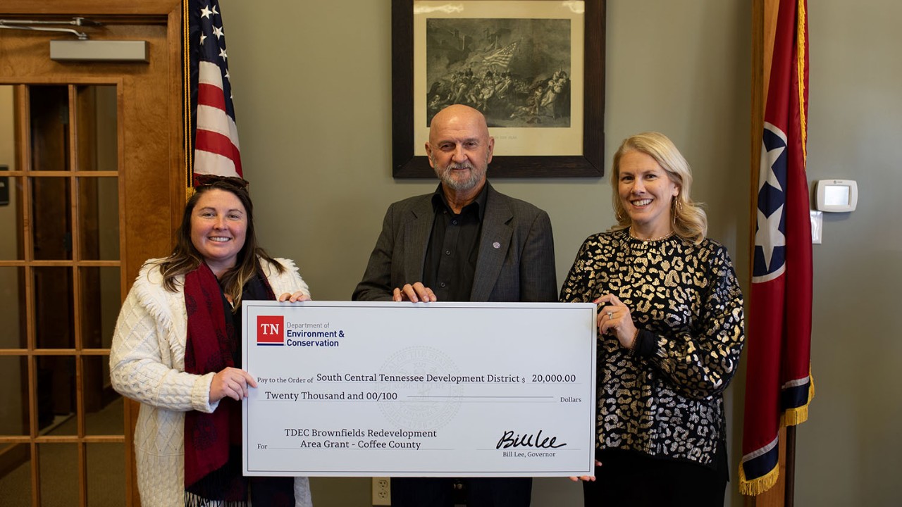 The Tennessee Department of Environment and Conservation (TDEC) presents a check for $20,000 to Coffee County for its plans in brownfield redevelopment. From left are Amy Dyman, coordinator of the Brownfield Redevelopment Area Grant program; Coffee County Mayor Dennis Hunt; and Lisa Cross, director of Rural Planning Organization / Infrastructure for the South Central Tennessee Development District.