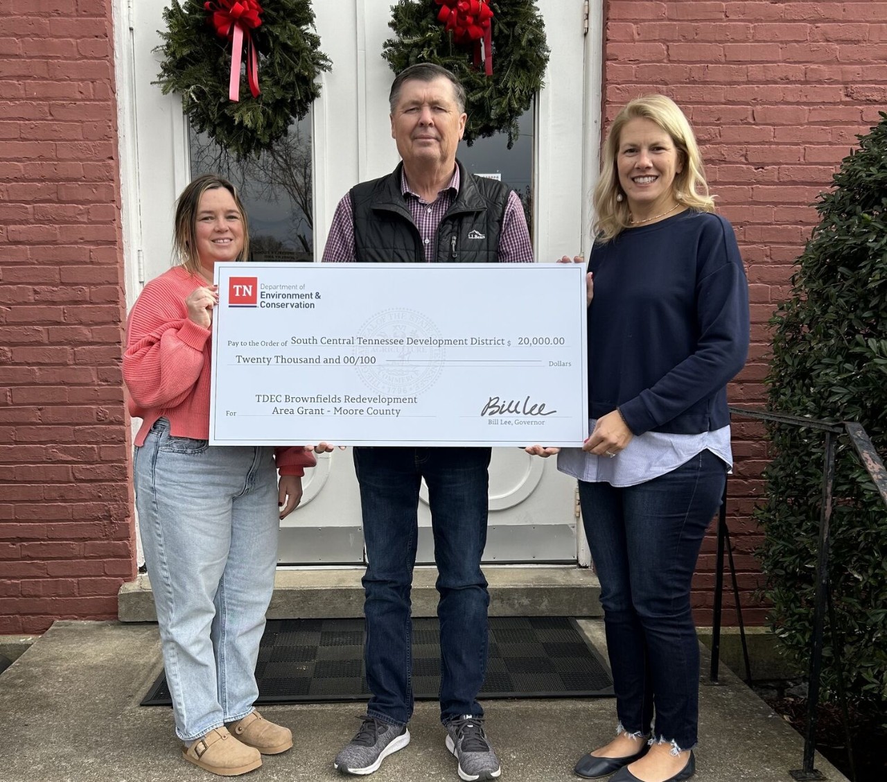 The Tennessee Department of Environment and Conservation presented a check for $20,000 for Moore County for brownfield redevelopment. From left are Misti Baker, director of Solid Waste for the South Central Tennessee Development District; Sloan Stewart, county executive for Moore County; and Lisa Cross, director of Rural Planning Organization/Infrastructure for the South Central Tennessee Development District.