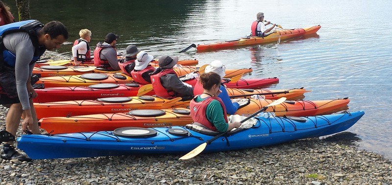 People in Kayaks