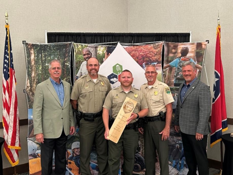 Henry Horton State Park receives the Excellence in Visitor Experience Award in the Tennessee State Parks annual Awards of Excellence. From left are Greer Tidwell, deputy commissioner for Conservation at the Tennessee Department of Environment and Conservation; Jacob Young, Area 3 manager, Tennessee State Parks; Shaun Rainone, park manager, Henry Horton State Park; Kim Moore, director of operations, Tennessee State Parks; and Chris Padgett, chief of staff and parks administrator.