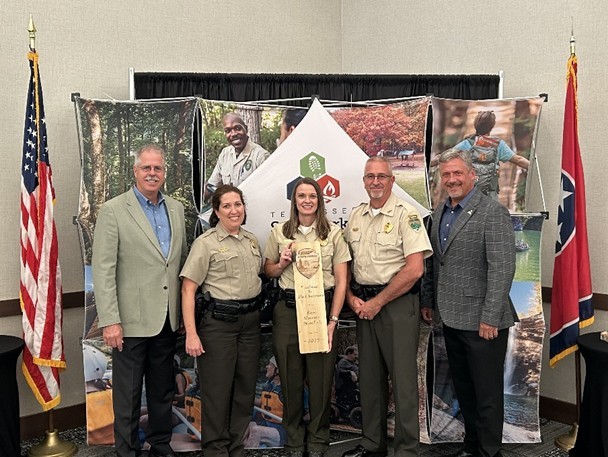 Roan Mountain State Park receives the Excellence in Operations Award in the Tennessee State Parks annual Awards of Excellence. From left are Greer Tidwell, deputy commissioner for Conservation at TDEC; Veronica Greear, Area 6 manager, Tennessee State Parks; Monica Johnson, park manager, Roan Mountain State Park; Kim Moore, director of operations, Tennessee State Parks; and Chris Padgett, chief of staff and parks administrator