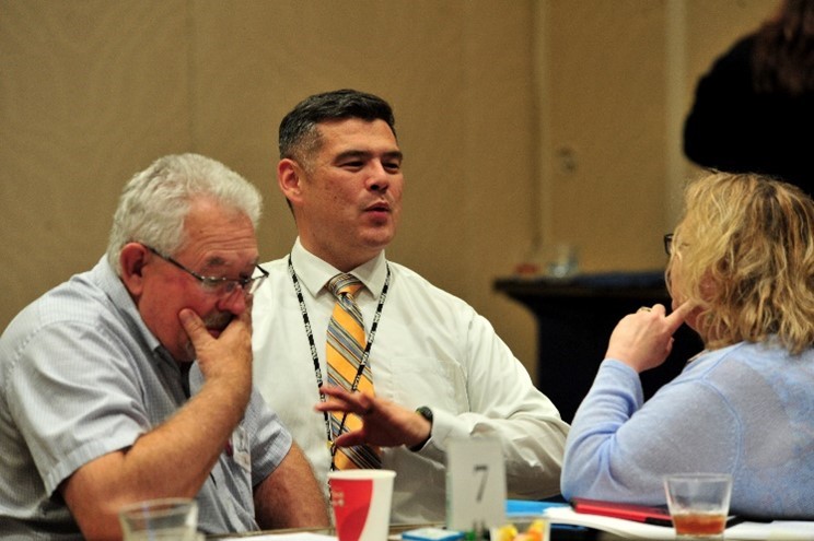 TEMA Director Patrick Sheehan (center) discusses fuel shortage response strategies with Emily LeRoy (right), executive director of the Tennessee Fuel and Convenience Store Association, and Rick Beals (left), the now-retired emergency services coordinator for the Tennessee Department of Transportation.  