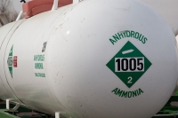 photo of an anhydrous ammonia fertilizer storage tank on a farm