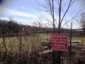 photograph of a hazardous waste site danger sign