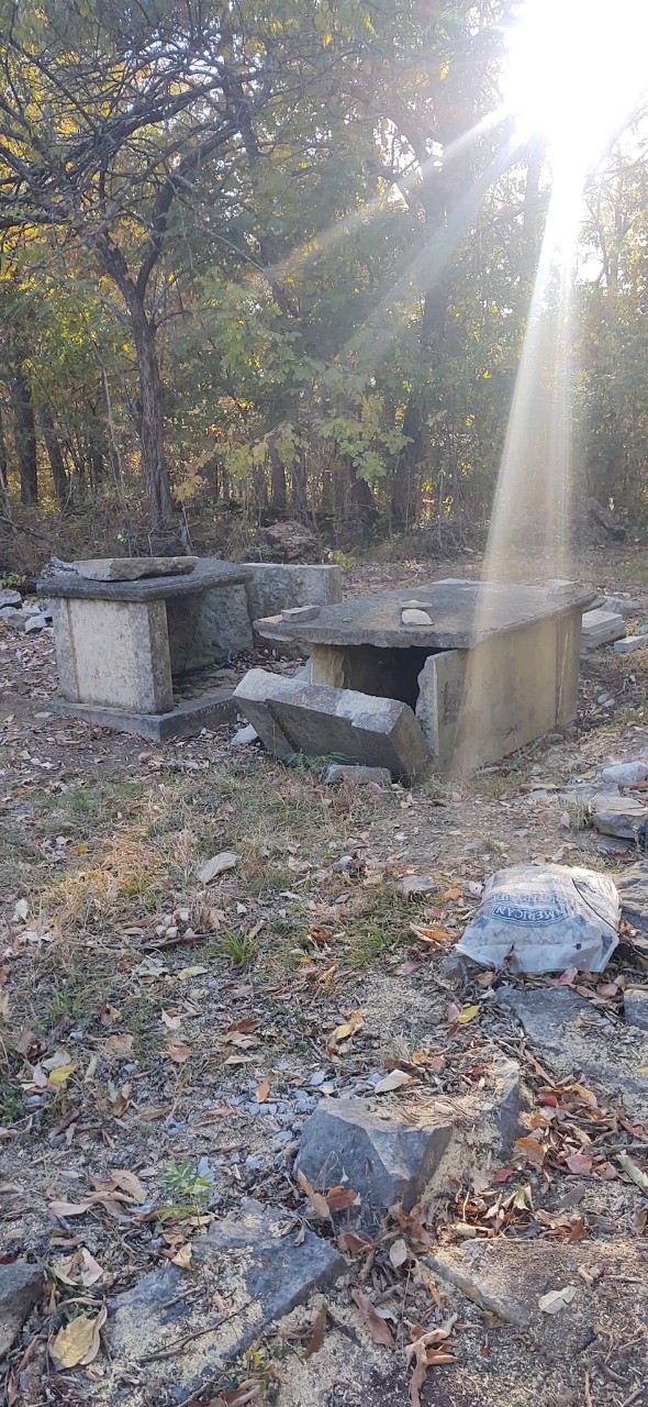 Image of box tombs prior to repair