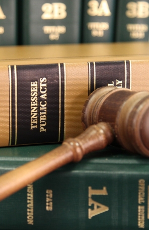 Image of the book of Tennessee Public Acts with a gavel