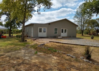 Image of a home with beige vinyl siding