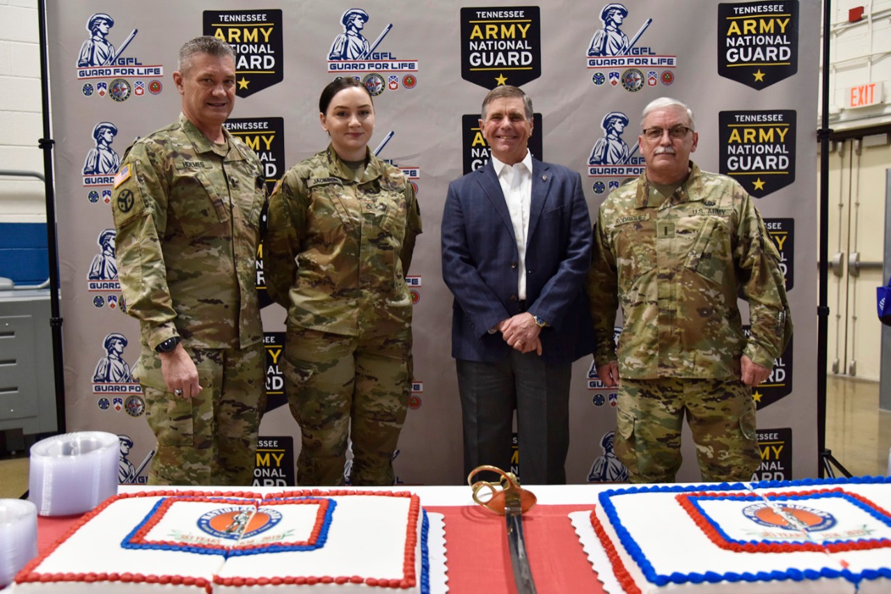 (L to R) Maj. Gen. Jeff Holmes, Tennessee’s Adjutant General, Pfc. Lindsey Jackson with the 301st Troop Command, retired Chief Warrant Officer 5 Robert Huffman, representative of the Association of the U.S. Army and Chief Warrant Officer 4 Frank Rodriguez 