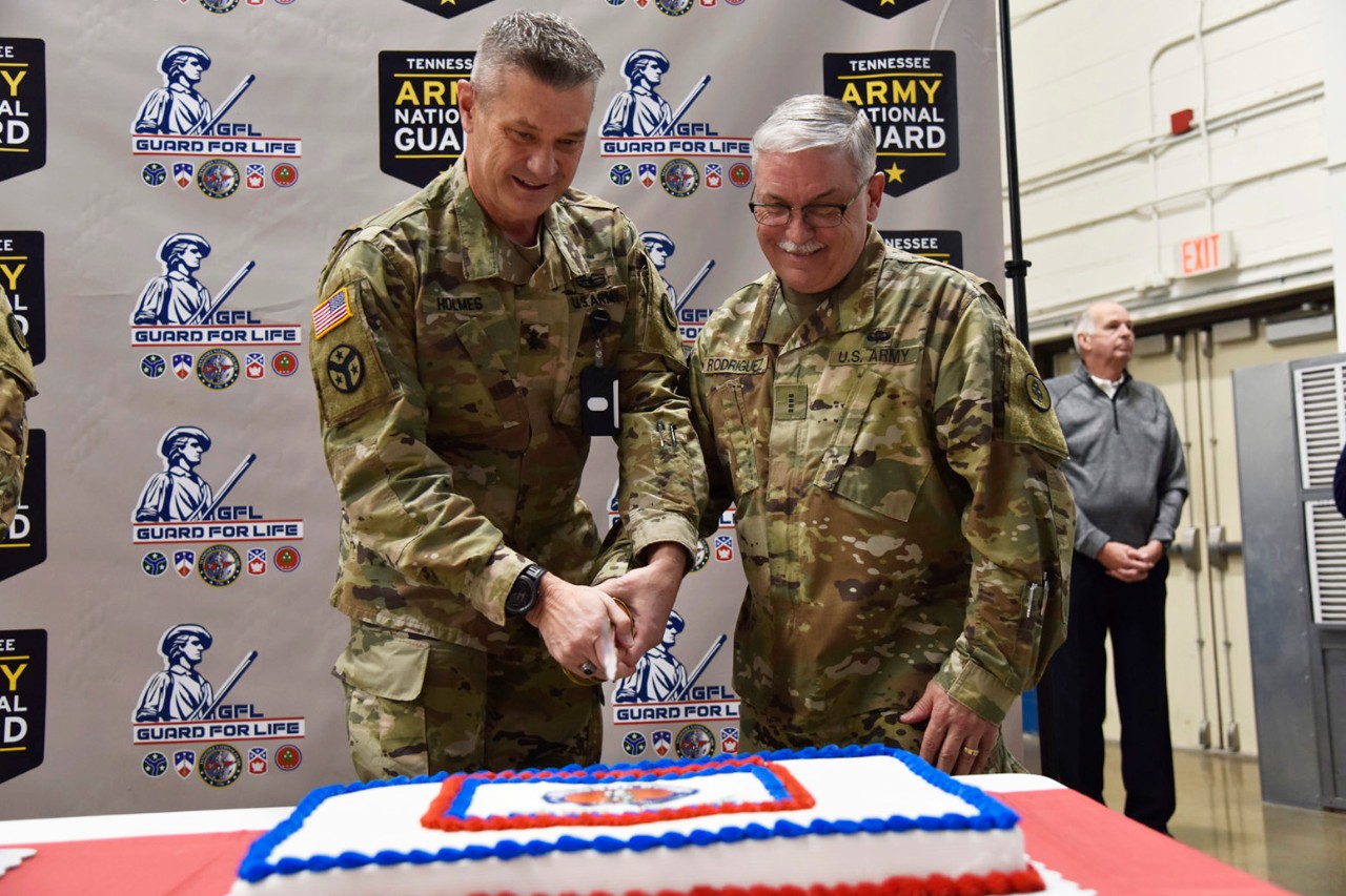 Maj. Gen. Jeff Holmes, Tennessee’s Adjutant General, and Chief Warrant Officer 4 Frank Rodriguez, representing the oldest member of the Tennessee National Guard, cut a cake during the birthday celebration
