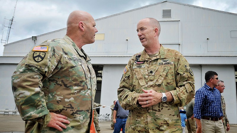 Tennessee Guard Unit Returns from Kosovo Tennessee’s Deputy Adjutant General, Maj. Gen. Tommy Baker (L) talks with 1-230th Assault Helicopter Battalion Commander, Lt. Col. Steve Todd (R)