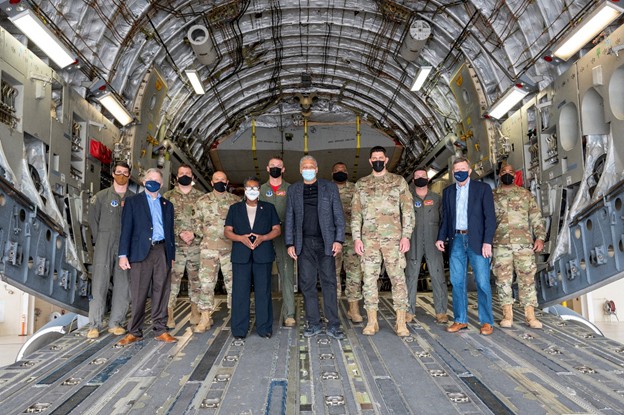 Members of Tennessee Air National Guard and elected officials pose for a photo on the back ramp of a C-17 during a “Get to Know Your Guard” tour in Memphis, April 16. (Photo by: Airman 1st Class Travonna Hawkins)